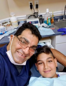 Doctor Kasparian with a child patient
